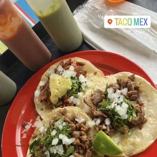 Carne asada and Al pastor tacos