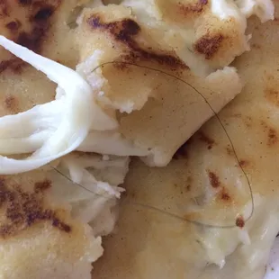 Disgusting hair in my pupusas. Yuck will never eat here again.