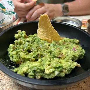Freshly made guacamole, I wish this was made tableside, then I could have said, no cilantro or onions. It was still delicious though.