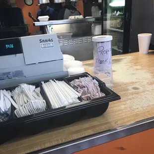 a tray of tacos and a cup of coffee