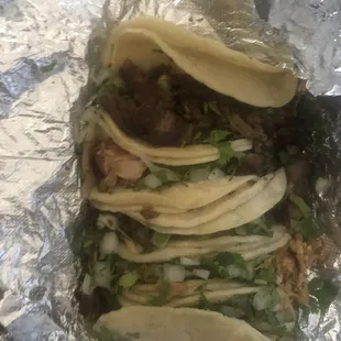 Chicken, steak, pork tacos