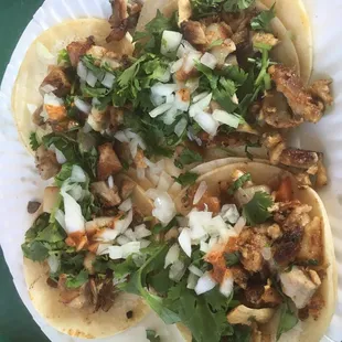 Two pollo. Two carnitas. $1.10 each.