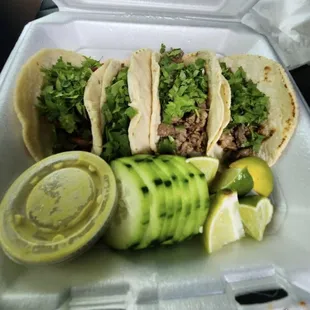 Steak tacos with fresh cilantro and hand made tortilla are delish