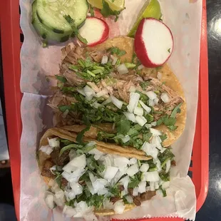 two tacos and a cucumber