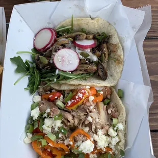 Sautéed mushroom taco and chicken thigh taco