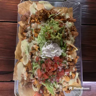 Nachos Texas
Three meat type 
Chicken, AL pastor (marinated pork), and Beef