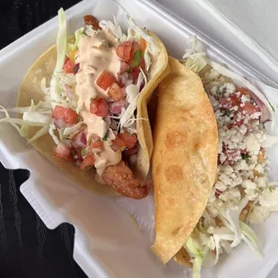 One crunchy potato taco and one fish taco. Each around d $3.95 as of 10/25/23