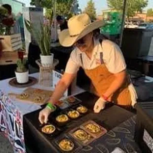 Chef Fernanda displays our tacos at Taste of Leawood