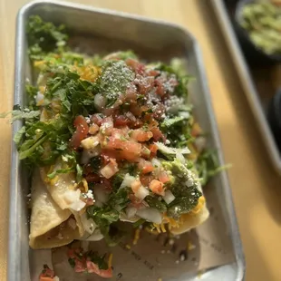 Rolled pollo tacos