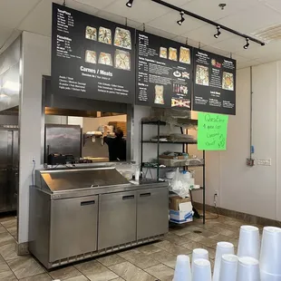 a view of a restaurant kitchen