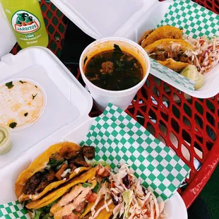 tacos and a drink on a table