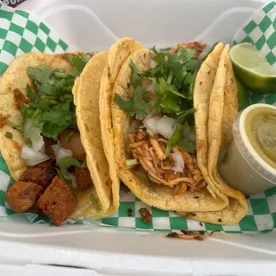 Taco del Pastor (left) and Taco de Pollo (right)