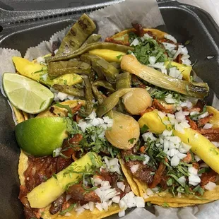 Four tacos al pastor