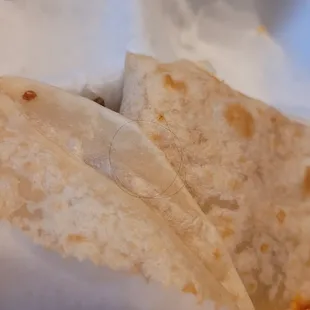 a close up of a burrito