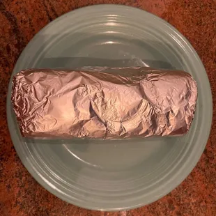 Super Burrito. Yes, that&apos;s a dinner plate.