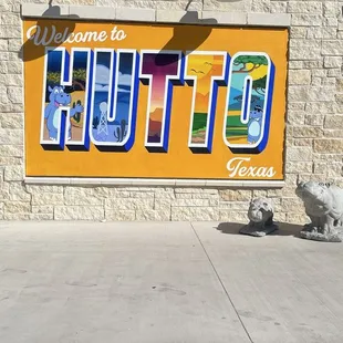 Side Wall with the Hutto Signature Hippos