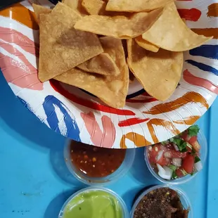 About 1/2 the free chips with salsas