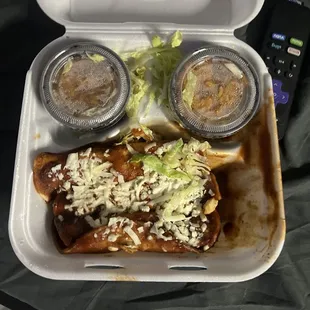 a meal in a styrofoam container