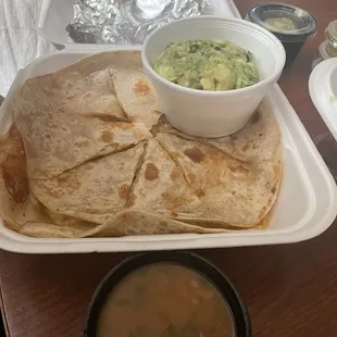 Chicken quesadilla with what&apos;s supposed to be a regular side of rice.