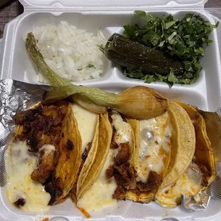 Mini Tacos Deluxe Pastor.  Not pictured, delicious charro beans.