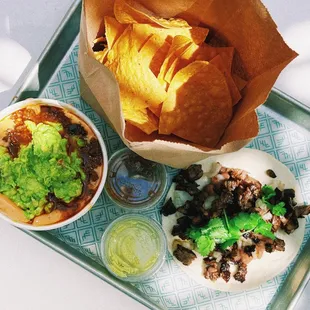 Queso (with all the add-ins) and a Carne Asada taco