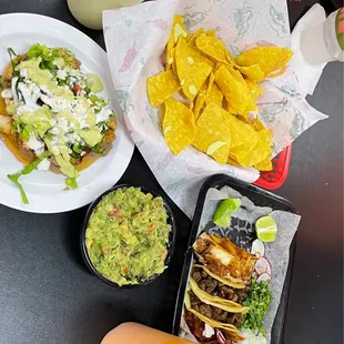Fresh guacamole, a chicken tostada &amp; a variety of delicious tacos