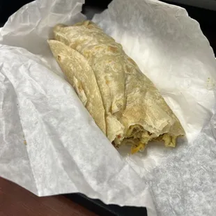 Bacon breakfast burrito with potato.