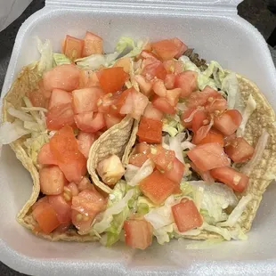 American style tacos.  Corn tortillas steak and barbacoa