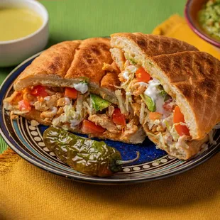 a sandwich cut in half on a plate