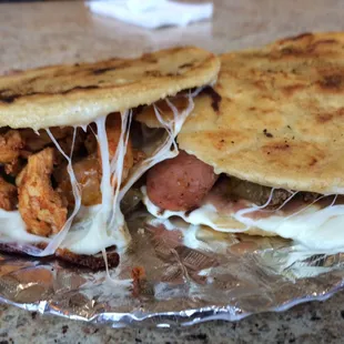 Gorditas (left-marinated chicken)(right-discada and chicharrón)