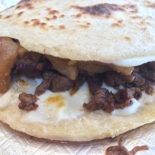 Gordita with beef fajita and chicharron