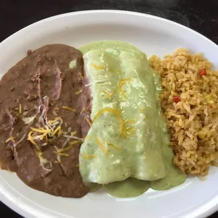 Two chicken enchiladas with sour cream sauce, rice and beans ($10)