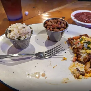 Small rice, small beans, onion and cheese enchilada.