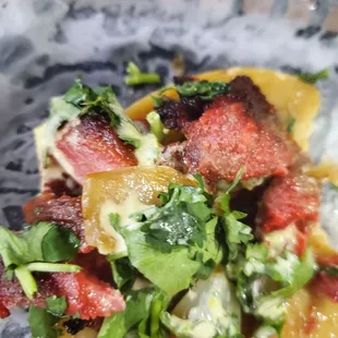 Trompo taco- get the creamy green sauce