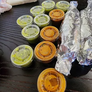 a variety of condiments on a table