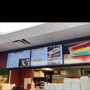 menus on the wall of a restaurant