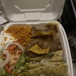 4 enchiladas, beans an rice an salad