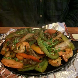 Shrimp and steak fajitas