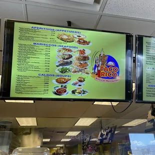 menus on a large screen in a restaurant