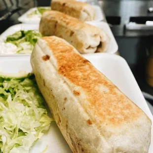 two burritos and a salad
