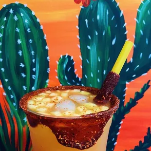 a drink in a tall glass