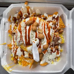 Mexican corn, Doritos, Nacho Cheese, Cojito Cheese, Crema, Valentino's, Mexican Peanuts. OMG! This is the bomb! So Much Goodness!