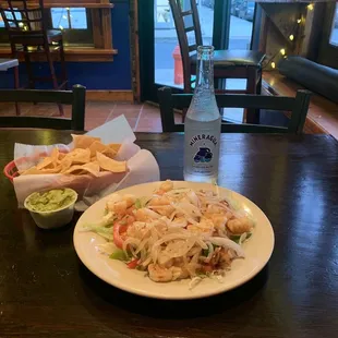 Grilled Shrimp Salad, guacamole &amp; salsa w chips , mineragua water