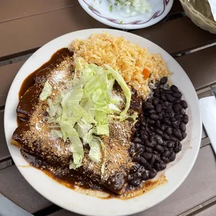 Mole enchiladas with chicken.