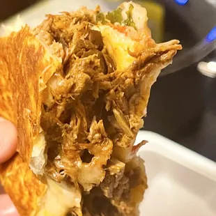 Birria Supreme Crunch Wrap they stuff it down with MEAT!!