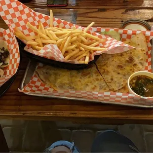 Carne asada tacos, quesabirria w consume, French fries, and agua de naranja mixed w a bit of agua de Jamaica