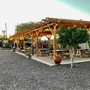 Taco Truck in back of adorable patio space.