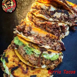 a close up of a taco stack