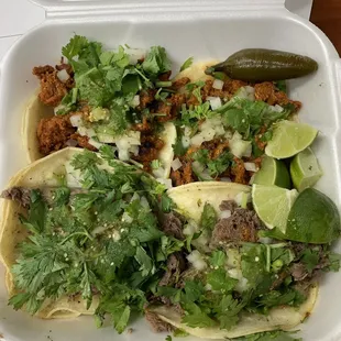 Two lengua and two pastor tacos - bomb