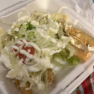 Tacos tapatios. Chicken flautas with ranchero sauce , mozzarella cheese, sour cream, lettuce &amp; tomato.